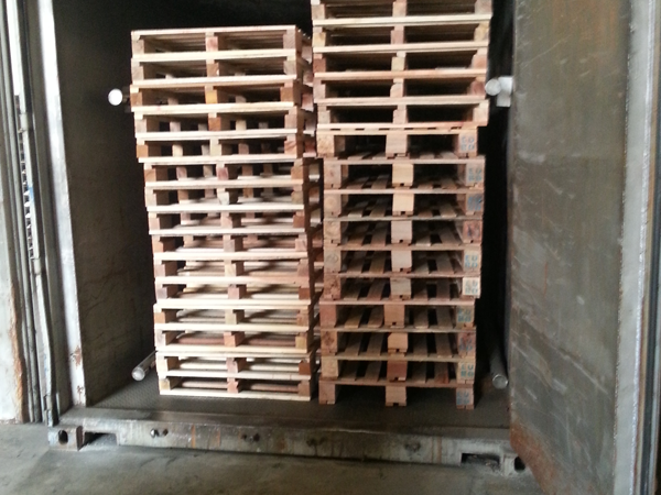 Pallets are stacked in the heat treatment chamber ready to be treated at core temperatures